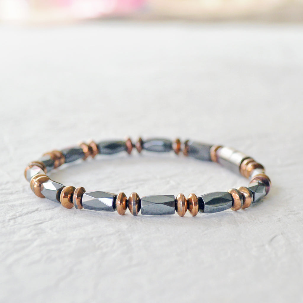 Men's magnetic bracelet handcrafted with high power black magnetic hematite beads and copper metallic magnetic hematite beads. It is secured with a strong magnetic clasp.  Wear as a magnetic bracelet or magnetic ankle bracelet.