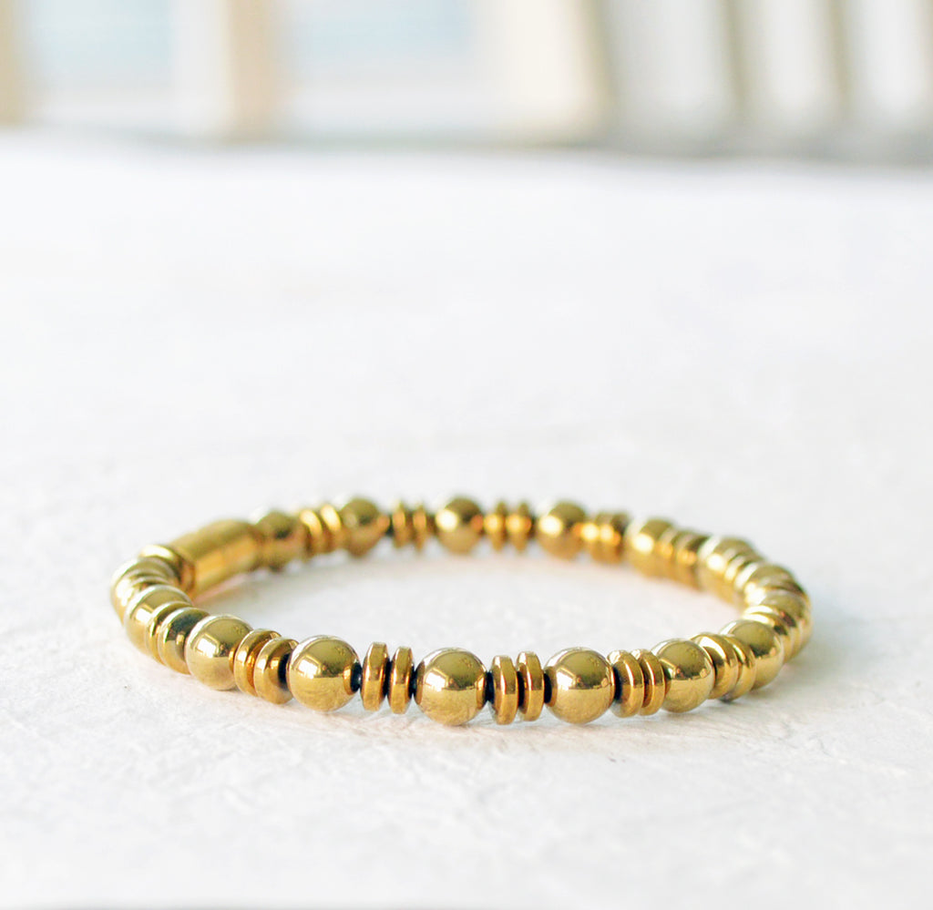 Magnetic bracelet for pain handcrafted with gold metallic magnetic hematite beads. It is secured with a strong magnetic clasp and wears great as a magnetic bracelet or magnetic ankle bracelet.