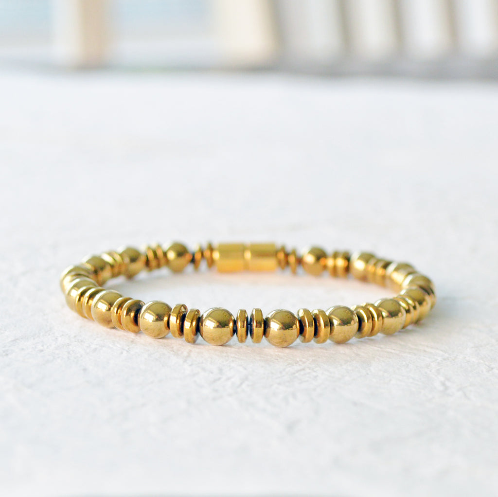 Magnetic bracelet for pain handcrafted with gold metallic magnetic hematite beads. It is secured with a strong magnetic clasp and wears great as a magnetic bracelet or magnetic ankle bracelet.