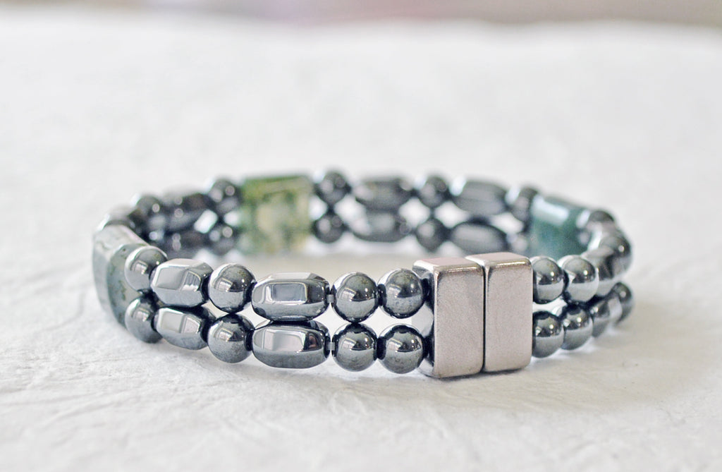 Magnetic bracelet handcrafted with black high power magnetic hematite beads and green moss agate gemstone beads. It is secured with a strong and easy-to-use magnetic clasp.