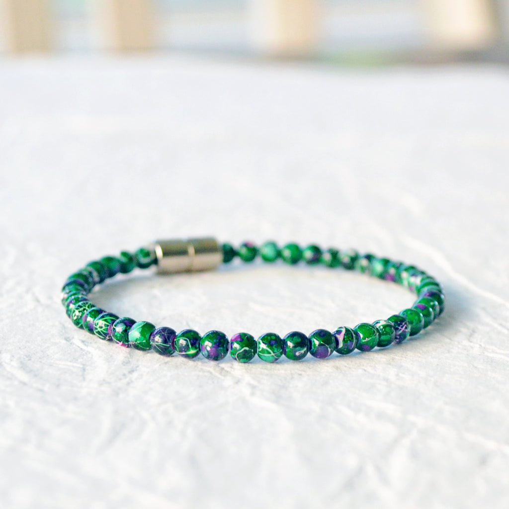 Magnetic bracelet handcrafted with green picasso hematite magnetic beads and secured with a strong magnetic clasp. Wear as a magnetic bracelet or magnetic ankle bracelet.