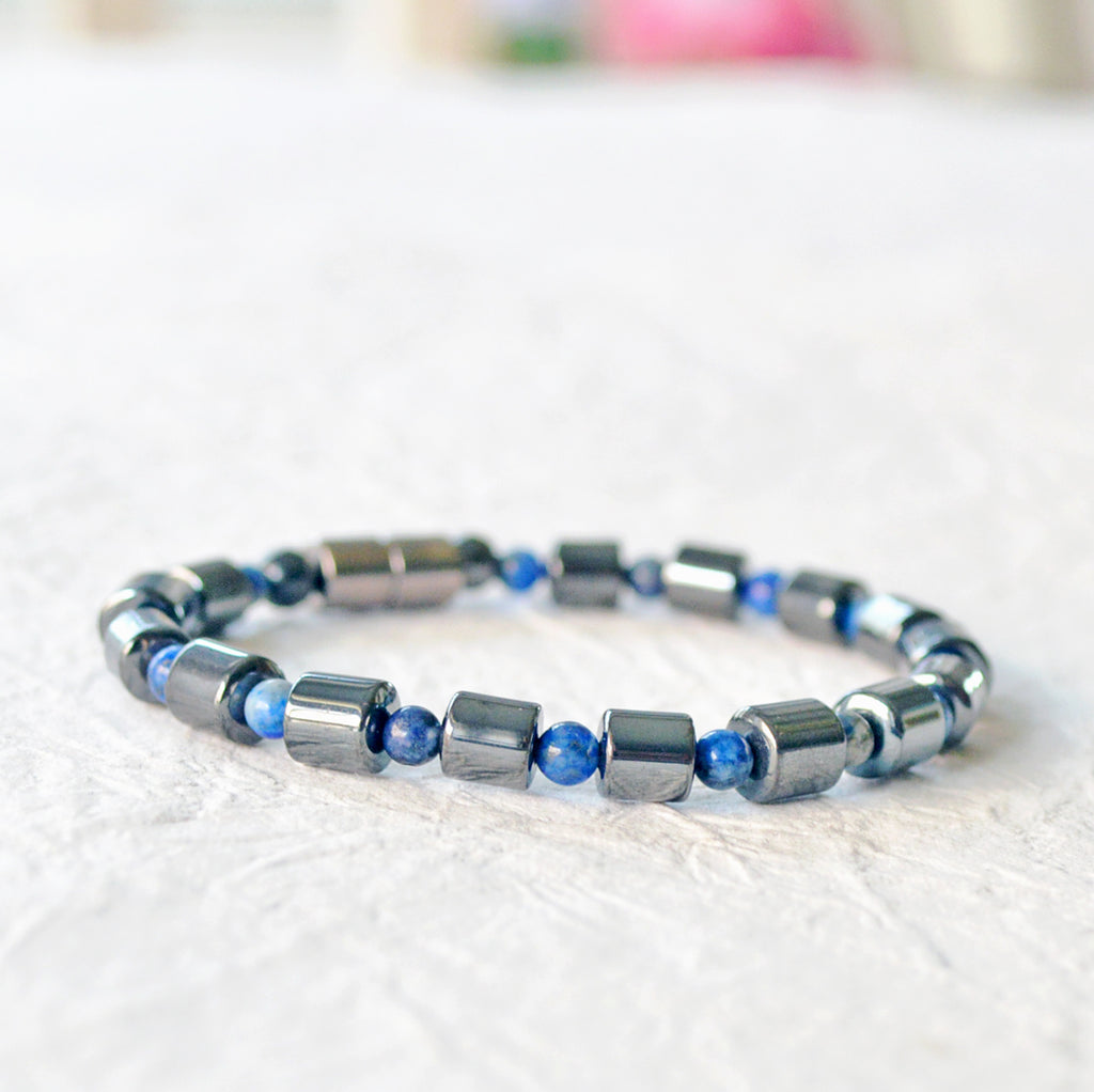 Magnetic bracelet handcrafted  with alternating black magnetic hematite and lapis lazuli gemstone beads. Secured with a strong magnetic clasp that can be worn as a magnetic bracelet or magnetic ankle bracelet.
