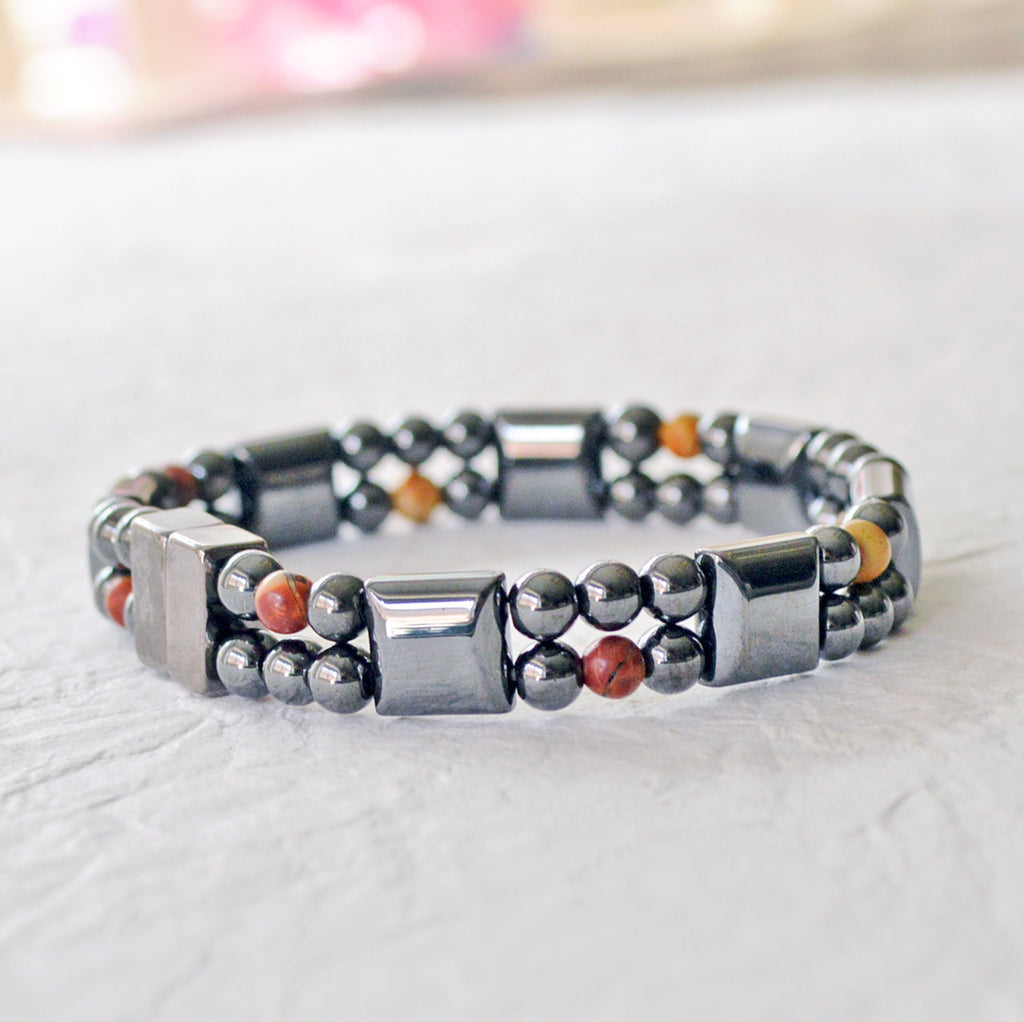 Double strand magnetic bracelet handcrafted with black magnetic hematite beads and red creek jasper gemstone beads. Secured with a strong and easy-to-use rare earth magnetic clasp.