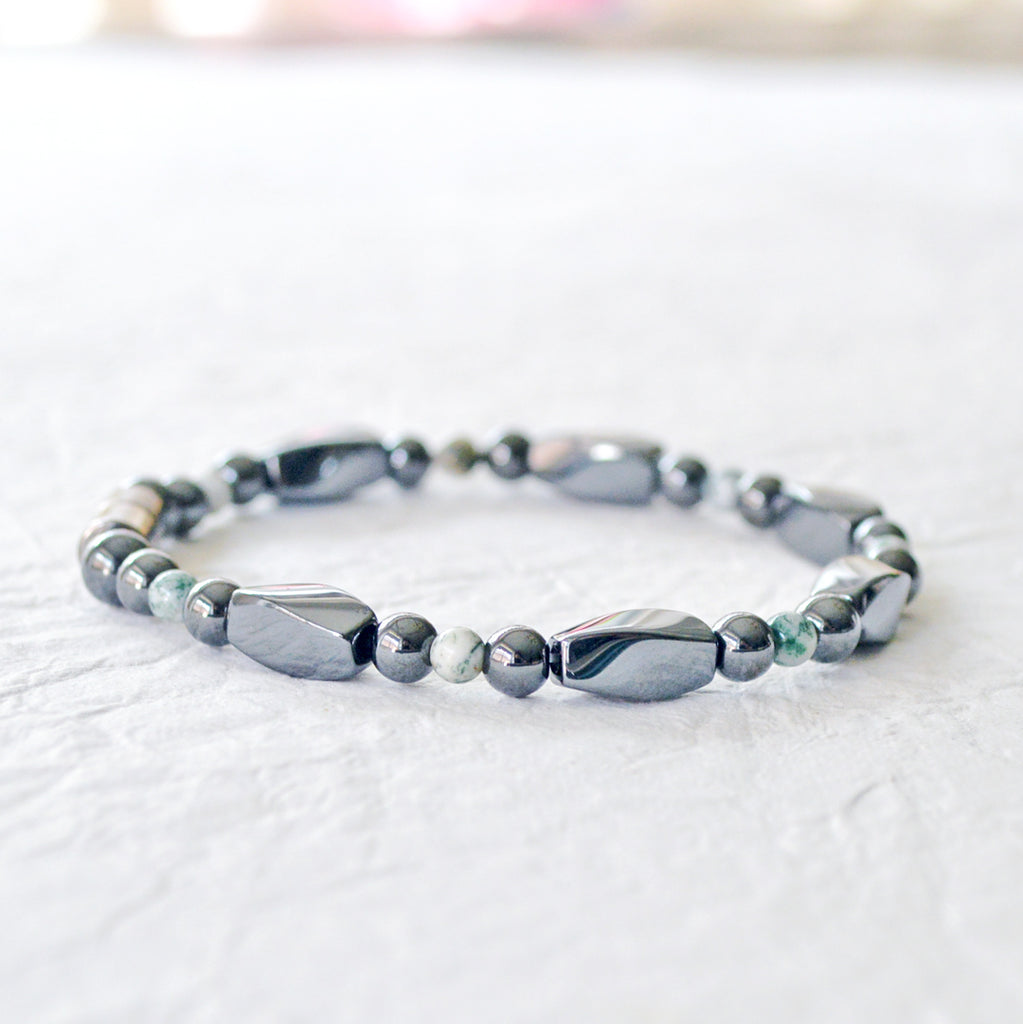Magnetic bracelet with black high power magnetic hematite beads and tree agate gemstone beads. Secured with a strong magnetic clasp. Wear as a magnetic bracelet or magnetic ankle bracelet.