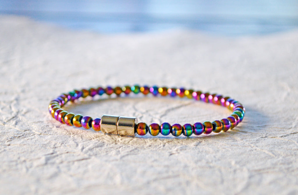 Magnetic bracelet  handcrafted with iridescent rainbow hematite magnetic beads. It is secured with a strong and easy-to-use magnetic clasp.