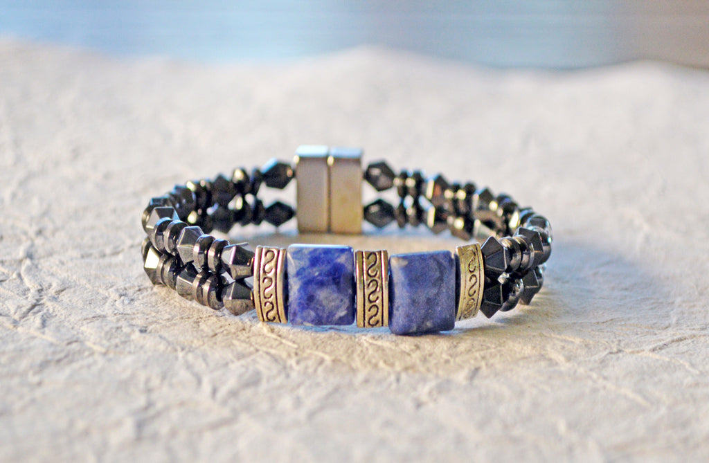 Double strand magnetic bracelet handcrafted with black magnetic hematite beads and sodalite gemstone beads. It is secured with a strong and easy-to-use rare earth magnetic clasp.