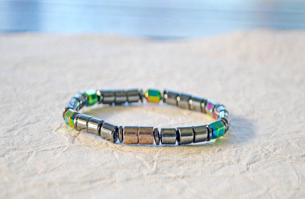 Magnetic bracelet is handcrafted with black high power and rainbow hematite magnetic beads. It is secured with a strong and easy-to-use magnetic clasp.