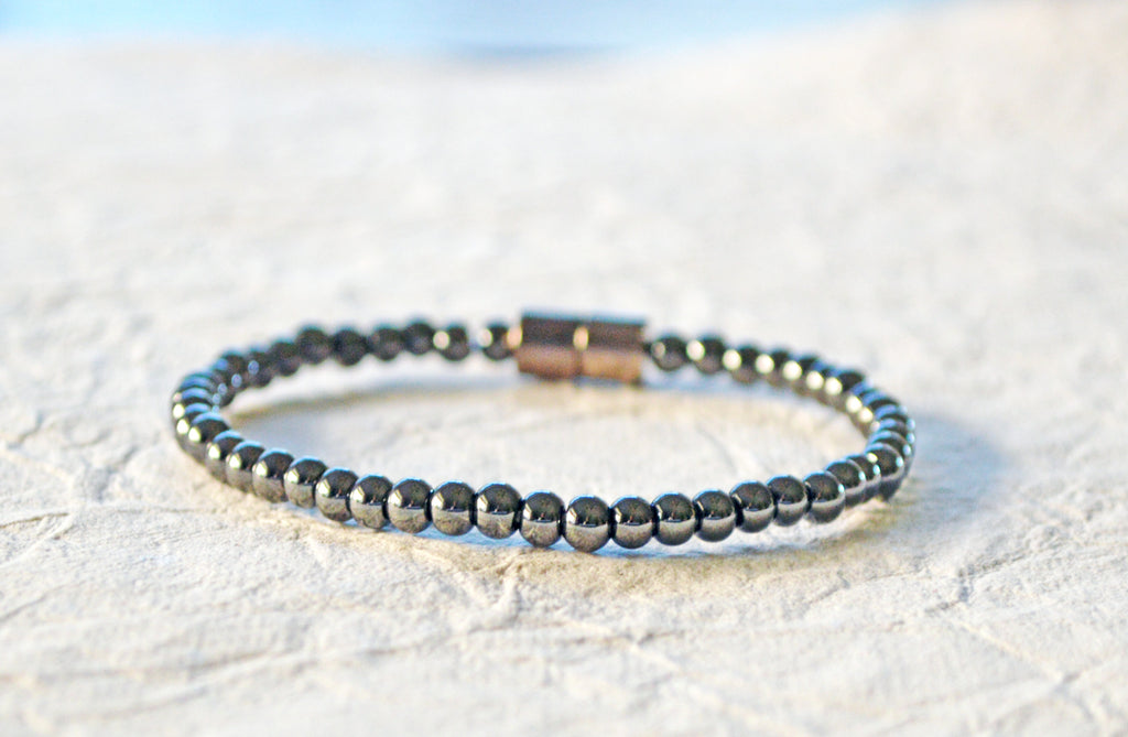 Magnetic bracelet handcrafted with black high power magnetic hematite beads and secured with a strong magnetic clasp.