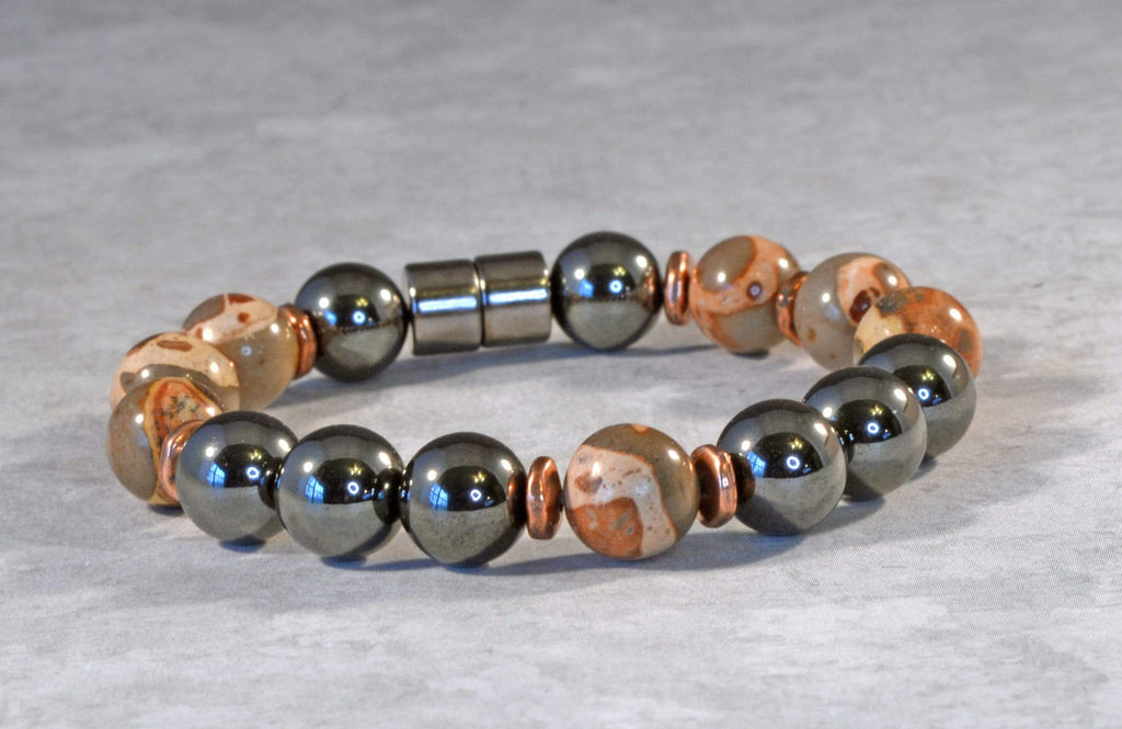 Magnetic bracelet handcrafted with black high power magnetic hematite beads, safari jasper gemstone beads, and antique copper spacer beads. It is secured with a strong and easy-to-use magnetic clasp.