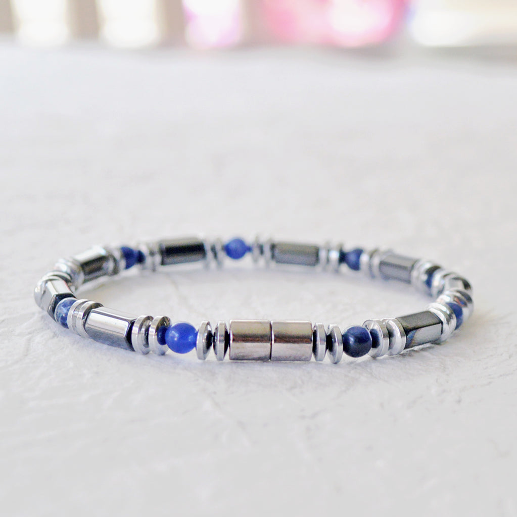 Magnetic bracelet handcrafted with black and silver metallic hematite magnetic beads with sodalite gemstone beads. It is secured with a strong magnetic clasp and wears great as a magnetic bracelet or magnetic ankle bracelet.