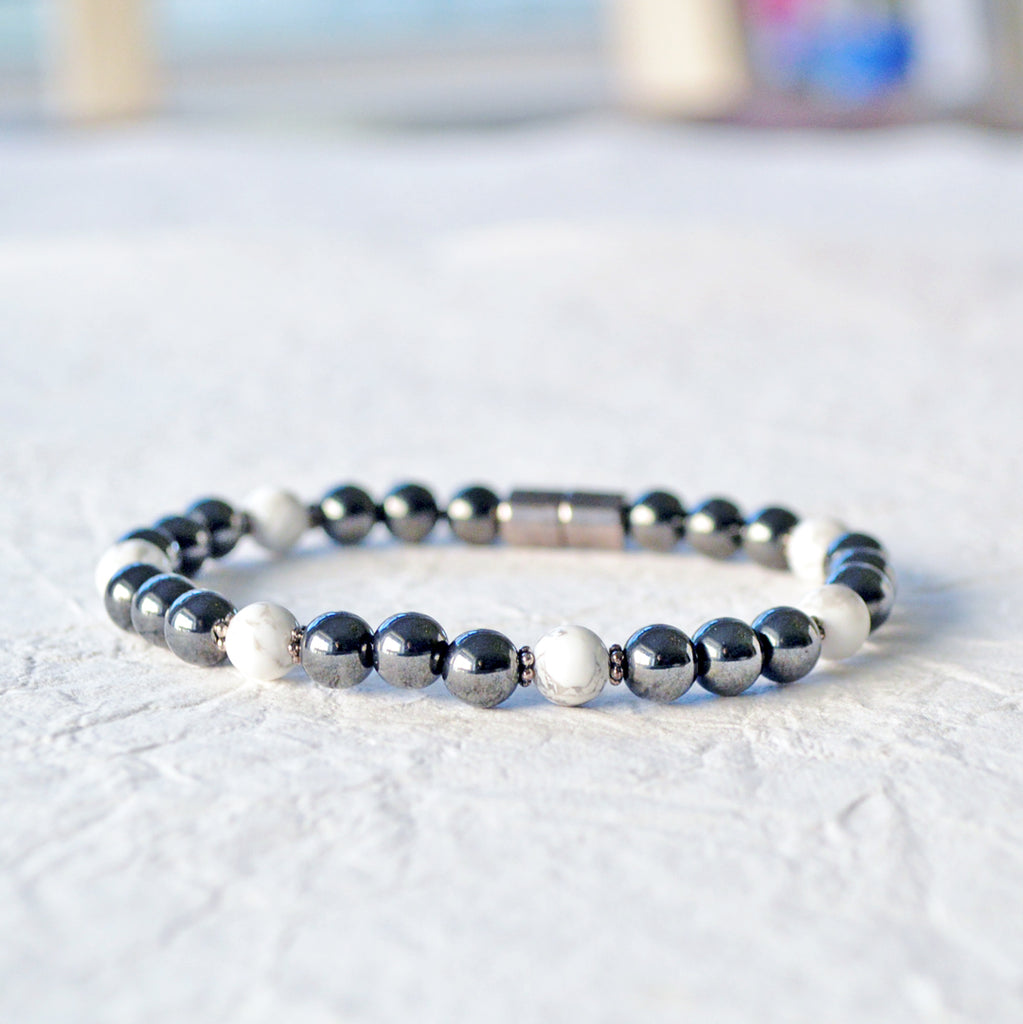 Magnetic bracelet handcrafted with high power black magnetic hematite beads with white howlite gemstone beads. Secured with a strong and easy-to-use magnetic clasp.