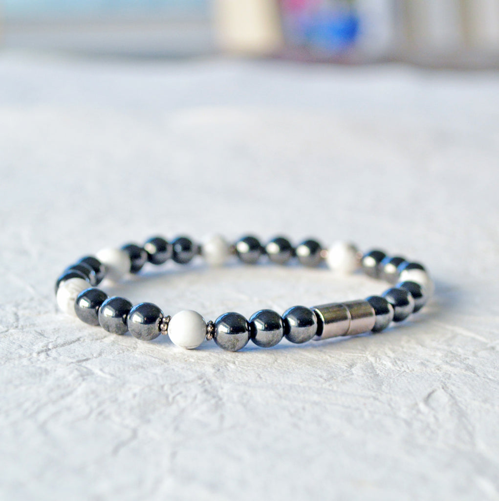 Magnetic bracelet handcrafted with high power black magnetic hematite beads with white howlite gemstone beads. Secured with a strong and easy-to-use magnetic clasp.