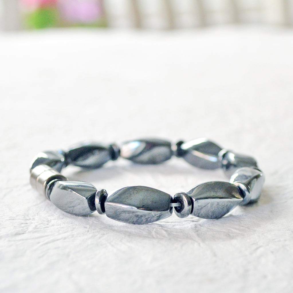 Magnetic therapy bracelet handcrafted with powerful black magnetic hematite beads and secured with a strong magnetic clasp.