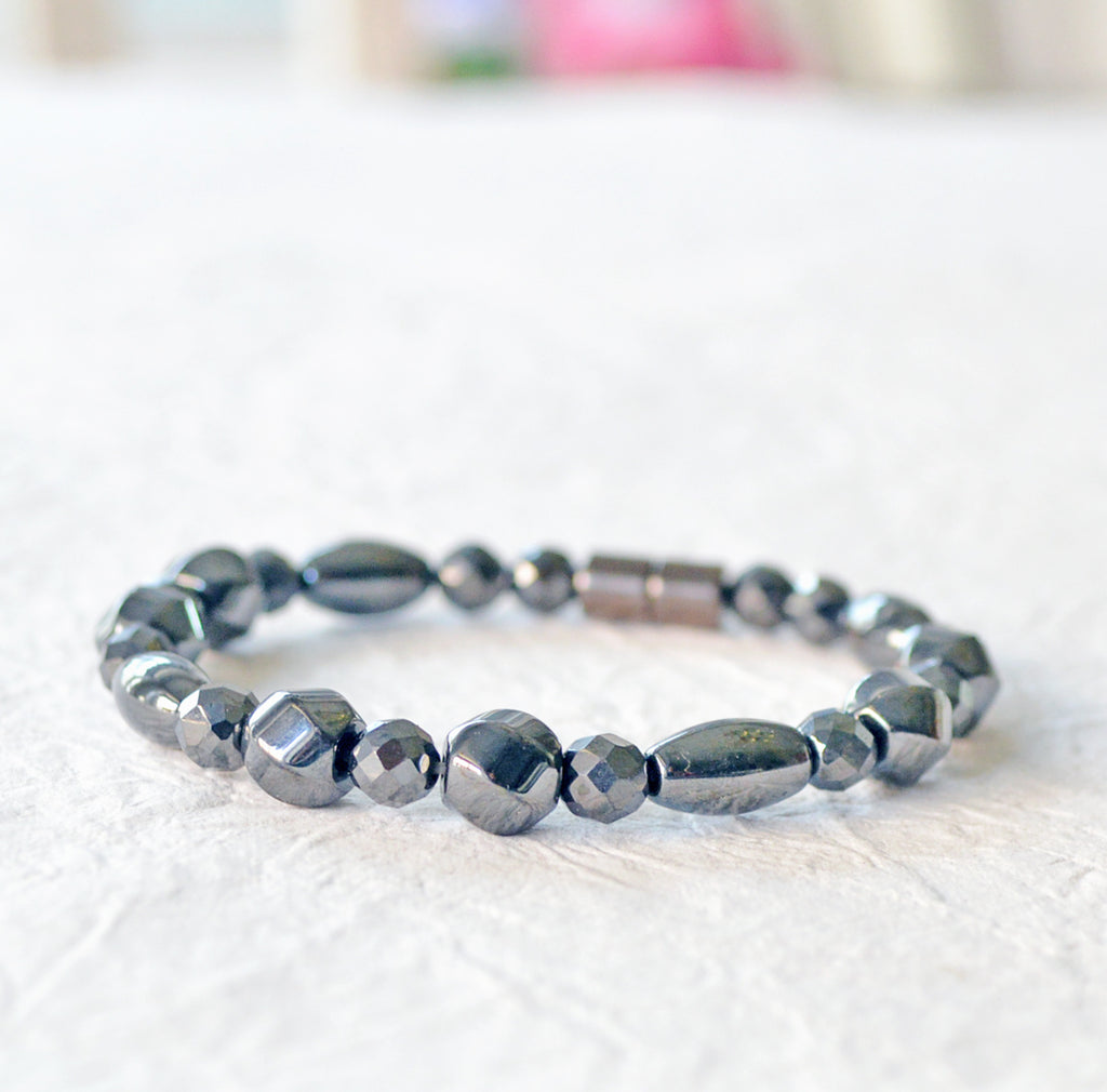Black magnetic bracelet handcrafted with powerful black magnetic hematite beads. Secured with a strong and easy-to-use magnetic clasp.