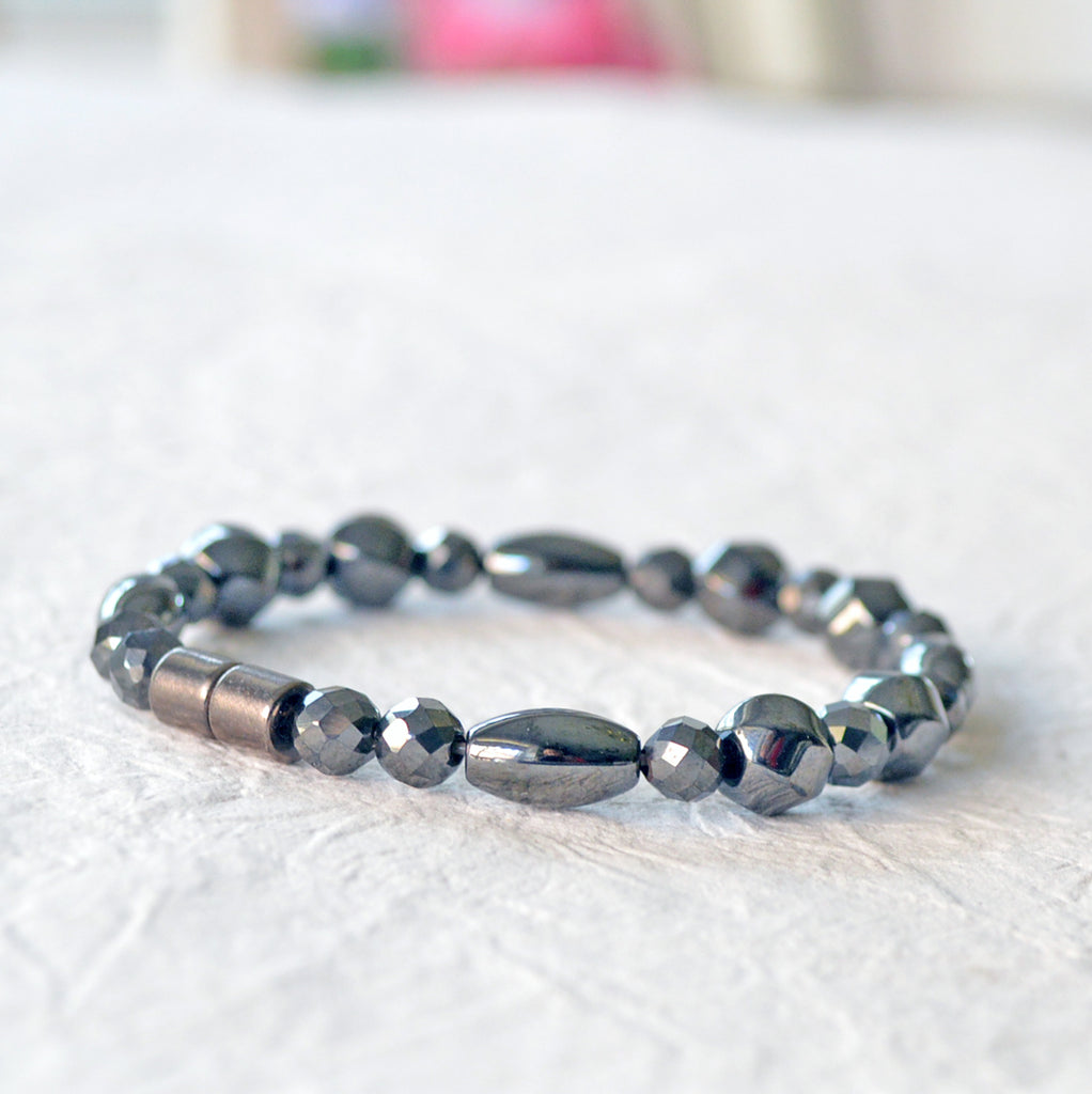 Black magnetic bracelet handcrafted with powerful black magnetic hematite beads. Secured with a strong and easy-to-use magnetic clasp.