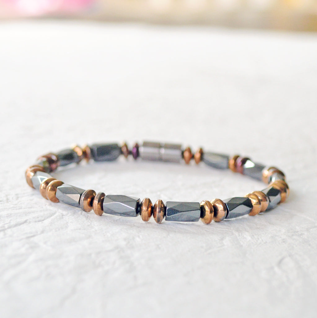 Men's magnetic bracelet handcrafted with high power black magnetic hematite beads and copper metallic magnetic hematite beads. It is secured with a strong magnetic clasp.  Wear as a magnetic bracelet or magnetic ankle bracelet.