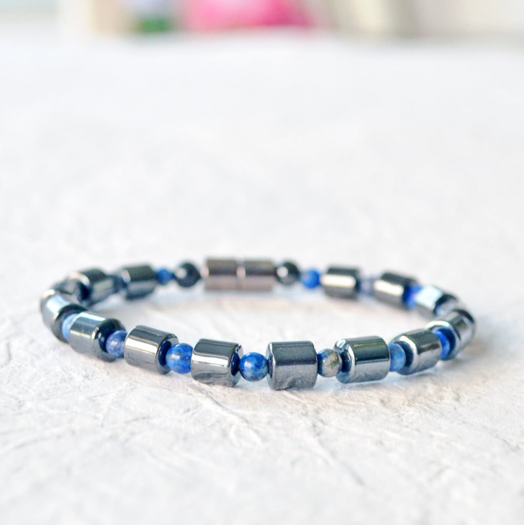 Magnetic bracelet handcrafted  with alternating black magnetic hematite and lapis lazuli gemstone beads. Secured with a strong magnetic clasp that can be worn as a magnetic bracelet or magnetic ankle bracelet.