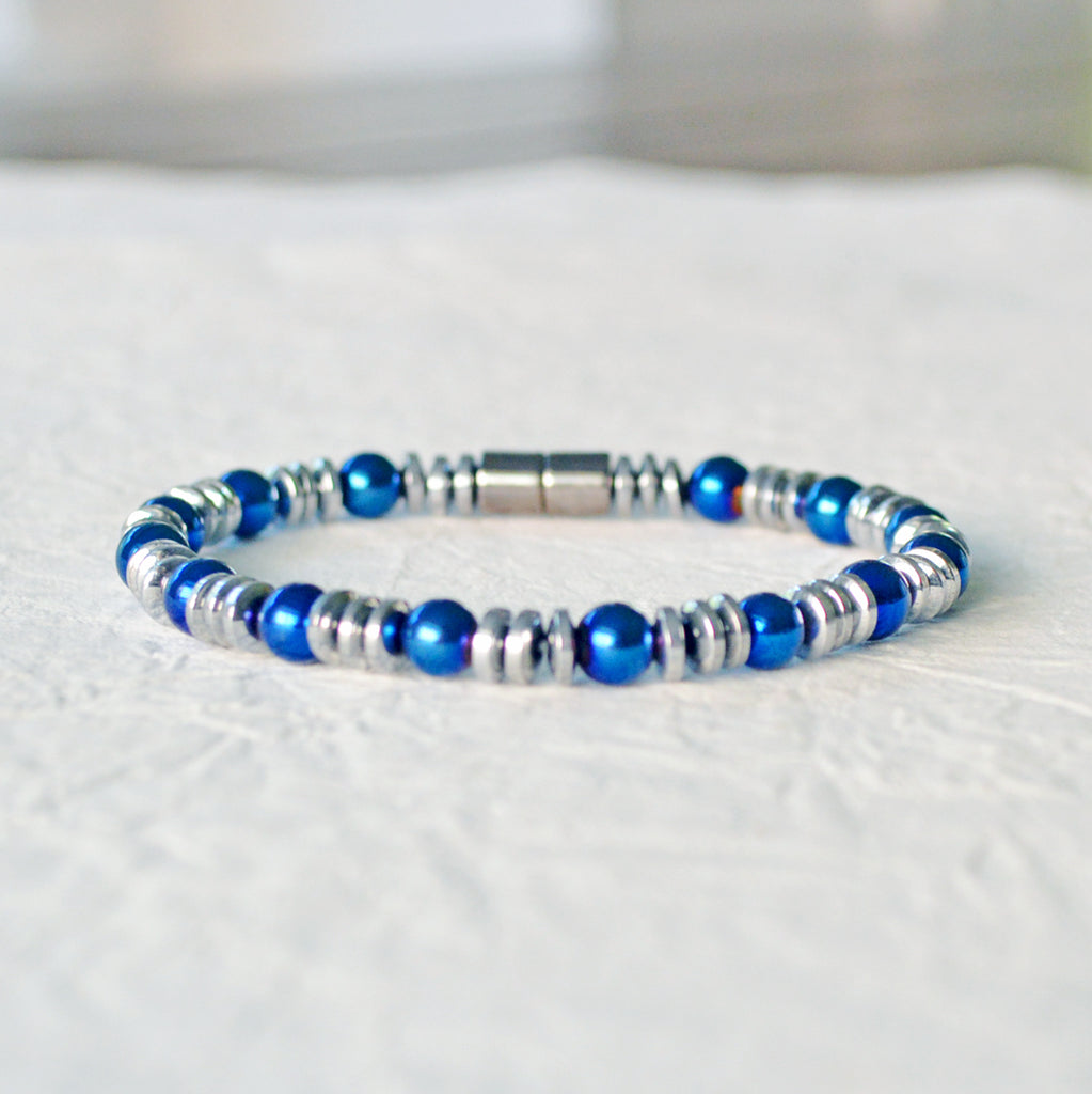 Metallic magnetic bracelet handcrafted with blue and silver metallic hematite magnetic beads. It is secured with a strong rare earth magnetic clasp. Wear as a magnetic bracelet or magnetic anklet.