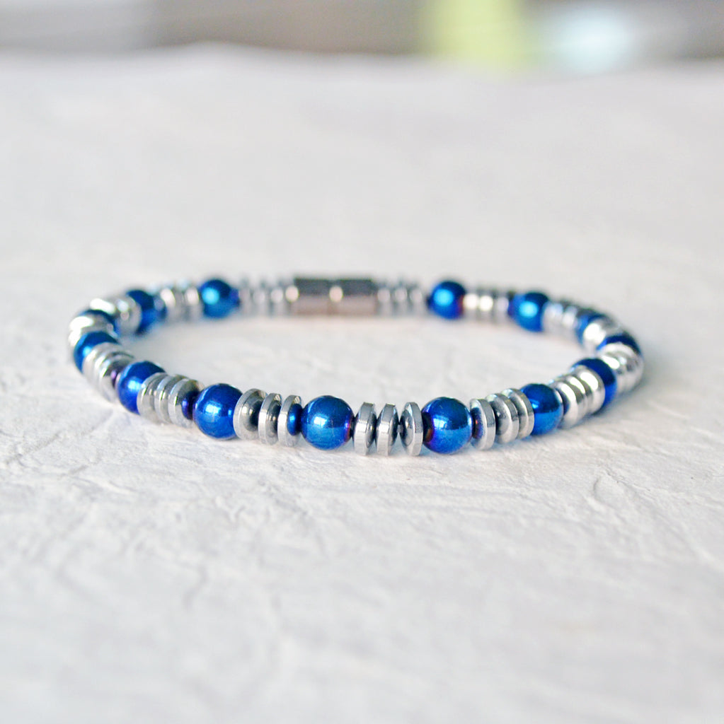 Metallic magnetic bracelet handcrafted with blue and silver metallic hematite magnetic beads. It is secured with a strong rare earth magnetic clasp. Wear as a magnetic bracelet or magnetic anklet.