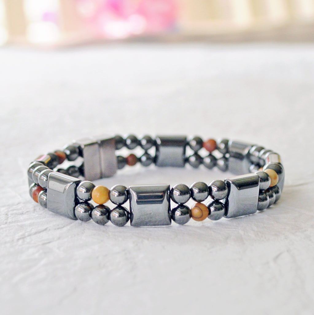 Double strand magnetic bracelet handcrafted with black magnetic hematite beads and red creek jasper gemstone beads. Secured with a strong and easy-to-use rare earth magnetic clasp.