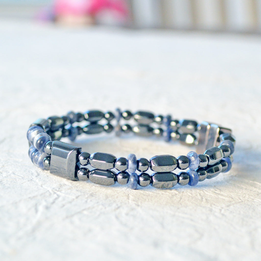 Powerful magnetic bracelet handcrafted with black high power magnetic hematite beads and sodalite gemstone beads. It is secured with a strong magnetic clasp.