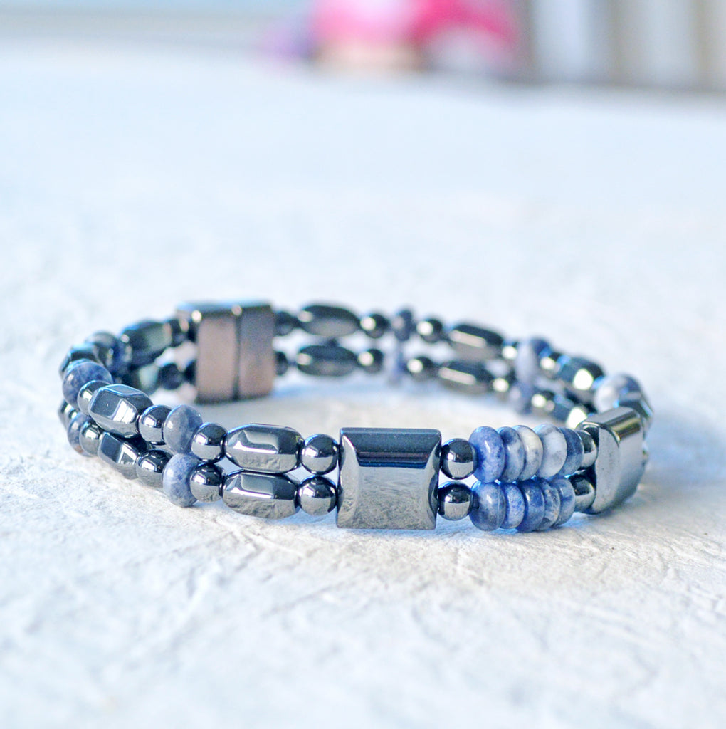 Powerful magnetic bracelet handcrafted with black high power magnetic hematite beads and sodalite gemstone beads. It is secured with a strong magnetic clasp.