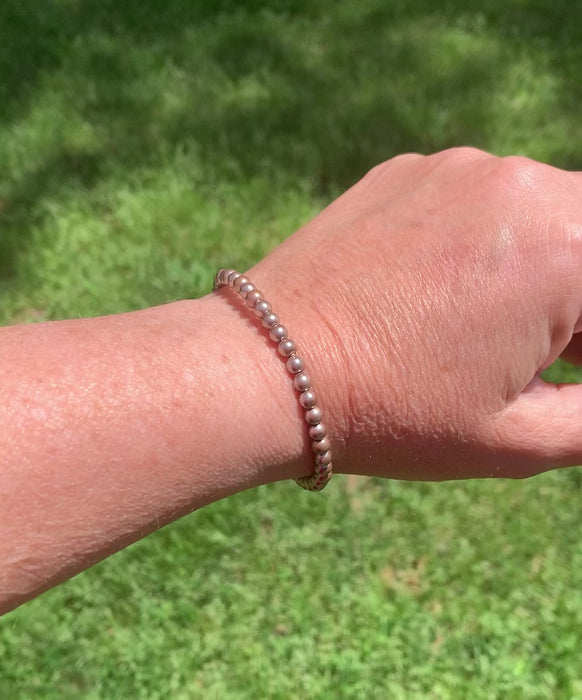 Magnetic bracelet for pain handcrafted with bronze pearl hematite magnetic beads and secured with a strong and easy-to-use rare earth magnetic clasp. It can be worn as a magnetic bracelet or as a magnetic ankle bracelet.