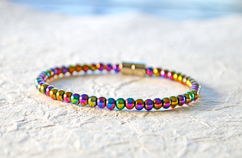 Magnetic bracelet  handcrafted with iridescent rainbow hematite magnetic beads. It is secured with a strong and easy-to-use magnetic clasp.