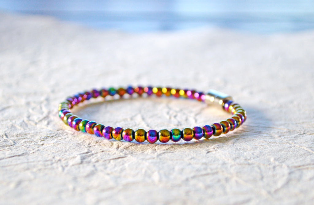 Magnetic bracelet  handcrafted with iridescent rainbow hematite magnetic beads. It is secured with a strong and easy-to-use magnetic clasp.