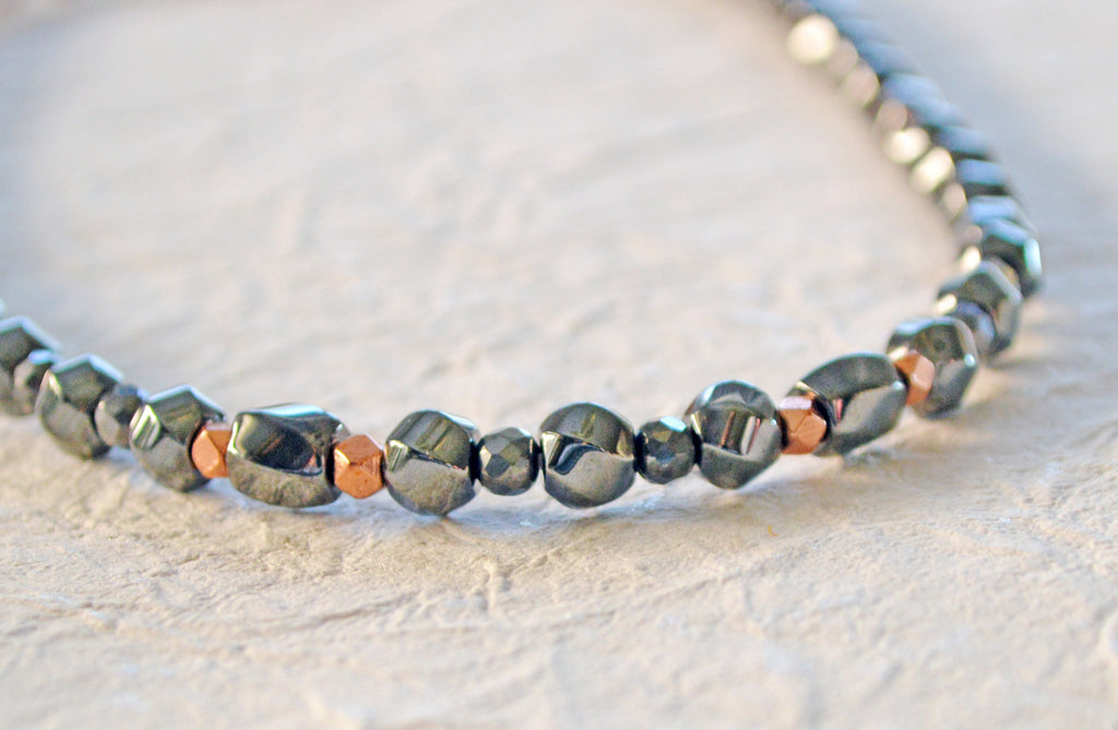 Magnetic necklace handcrafted with black high power magnetic hematite beads and genuine copper beads. It is secured with a strong and easy-to-use magnetic clasp.