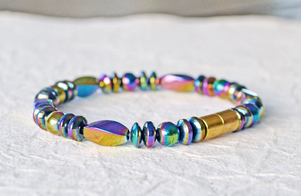 Magnetic therapy bracelet handcrafted with iridescent rainbow hematite magnetic beads. Bracelet is secured with a strong and easy-to-use magnetic clasp.