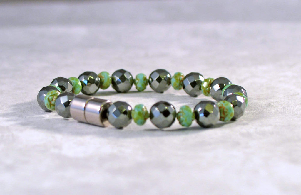 Magnetic Bracelet handcrafted with alternating black magnetic hematite and green turquoise czech glass beads. It is secured with a strong and easy-to-use magnetic clasp.