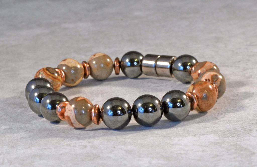 Magnetic bracelet handcrafted with black high power magnetic hematite beads, safari jasper gemstone beads, and antique copper spacer beads. It is secured with a strong and easy-to-use magnetic clasp.