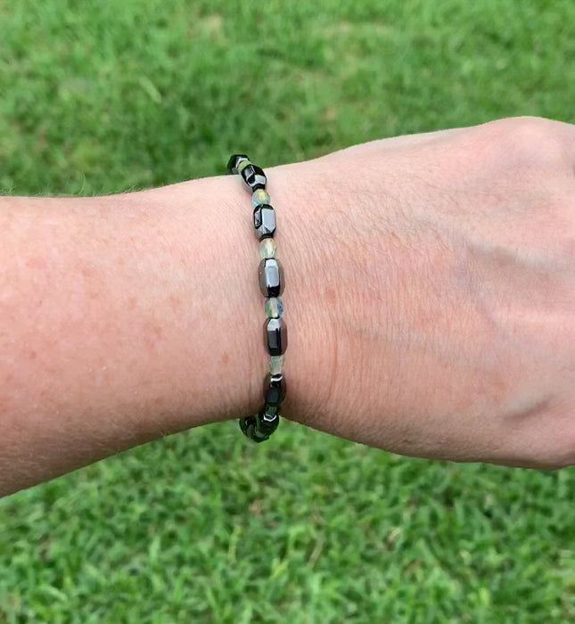 Magnetic bracelet is handcrafted with alternating black high power magnetic hematite beads and blue/green czech glass fire polished beads. It is secured with a strong magnetic clasp and makes a pretty magnetic bracelet or magnetic anklet.